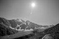 The sun over the glacier `Seven`. View from Cheget Mountain