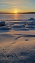 The sun over the snow-covered  lake in winter Royalty Free Stock Photo
