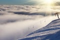 Sun over winter mountains, covered with snow. Royalty Free Stock Photo