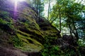 Sun peeking over a cliff Royalty Free Stock Photo