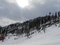 Sun, cloud and icy mountains Royalty Free Stock Photo