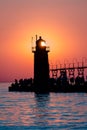 Sun perfectly framed in South Haven`s lighthouse at sunset