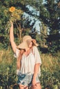 Sun Protection, sunscreen , UV protection, Time Outside and Stay Sun-safe. Young woman with straw hat protects from sun Royalty Free Stock Photo