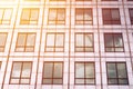 Sun ray and blue sky reflection on window office building, business concept Royalty Free Stock Photo