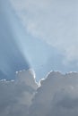 Sun ray light through down from rain cloud. Dark cloudy sky background, rainy season concept. Royalty Free Stock Photo