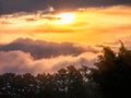 Sun ray on the morring with clouds and fog. Royalty Free Stock Photo