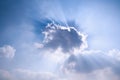 Sun rays behind the cloud Royalty Free Stock Photo