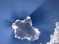 Sun rays behind cloud Royalty Free Stock Photo