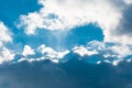 Sun rays behind dark clouds. The sun behind the cloud Royalty Free Stock Photo