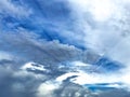 Sun rays on blue sky with clouds background picture image Stock Photo