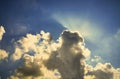 Sun rays break through the stormy cloud