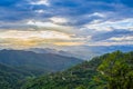 Sun rays bursting through the clouds with mountain view , Thailand Royalty Free Stock Photo