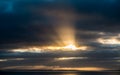 Sun Rays Bursting through Dark Clouds Royalty Free Stock Photo