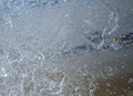 Sun rays caught in cracks in ice piece. Broken floe