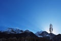 Sun rays and cellular transmitter in the sky over the Himalayas Royalty Free Stock Photo