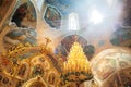 Sun rays coming throuth window on icons in Russian Orthodox church