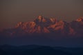 Sun rays mountain landscapeA beautiful landscape view with sunset golden hour through clouds from the top of a mountain.