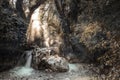 Sun rays over the stream inside the forest. Fine Art Morning Sun Rays on a river in Epirus Greece Royalty Free Stock Photo