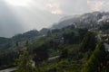 Sun rays over valley with rice terraces and fields. Cityscape of Sa Pa, Vietnam Royalty Free Stock Photo