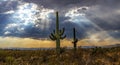 Sun Rays Peeking Through Clouds in Arizona Desert Royalty Free Stock Photo