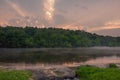 Sun rays shine over the Spring River