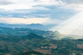 Sun rays shining down on hills in San Marino