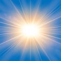 Sun rays. Starburst bright effect, isolated on blue background. Gold light star flash. Abstract shine beams. Vibrant Royalty Free Stock Photo