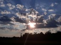 Sun rays sunset clouds evening Royalty Free Stock Photo