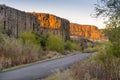 Sun Rays Touching Cliff at Dawn in Sun Lakes Dry Falls State Park, Washington Royalty Free Stock Photo