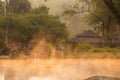 Sun reflecing on the Hot spring at national park during sunrise Royalty Free Stock Photo