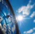 The sun is reflected in the wall clock Royalty Free Stock Photo