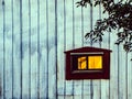 The sun is reflected in the window of my barn.