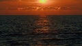 Sun Reflecting On Sparkling Sea Lake Water Surface. Rippled Water Surface At Sea During Golden Hour Sunset.