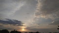 Sun rise in the cloudy sky Royalty Free Stock Photo