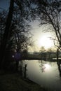 Sun rise sun set reflections of water and trees in rugby Warwickshire