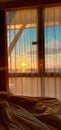 the sun rises from behind the window Royalty Free Stock Photo
