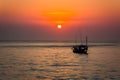 Sun rises over serene morning sea at Cha Am Beach