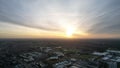 Sun rising above the city of Enschede, Netherlands