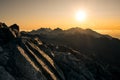 Sun rising over the beautiful mountains and clouds in High Tatras, Slovakia Royalty Free Stock Photo