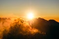 Východ slnka nad krásnymi horami a oblakmi vo Vysokých Tatrách, Slovensko