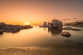 Sunrise over boulders and beach on Cavallo Island in Corsica Royalty Free Stock Photo