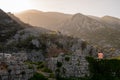 Sun rising in rock mountains in Kotor
