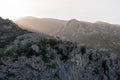 Sun rising in rock mountains in Kotor