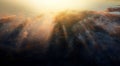 The sun rising or setting high above the clouds. View from the plane. Sunset over the ocean. Royalty Free Stock Photo