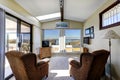 Sun room interior with exit to walkout deck Royalty Free Stock Photo