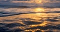 The sun's rays hit the surface of the water.Generative AI