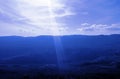 The sun`s ray above the hilly area Royalty Free Stock Photo