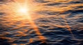 The sun's rays are crashing on the sea surface.Generative AI