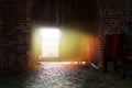 The sun's rays, the flow of light through the door into the interior of the castle Royalty Free Stock Photo