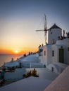 A group watching the sun go down on the Island of Santorini. Royalty Free Stock Photo